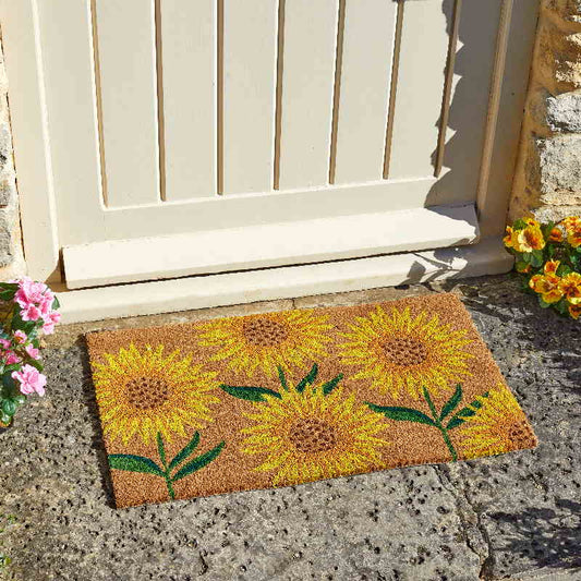 Sunflower Outdoor Door Mat in front of door