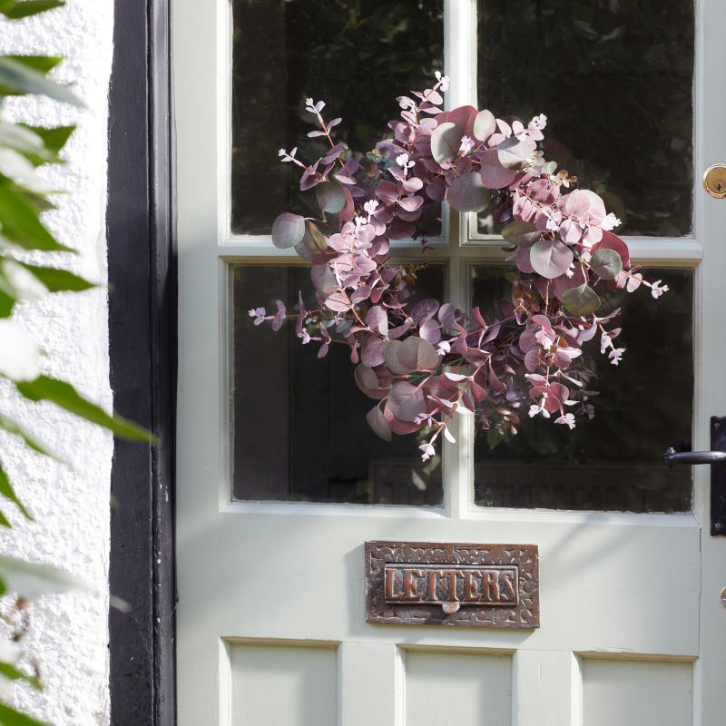 Violet Eucalyptus Wreath Door Decoration on a front door