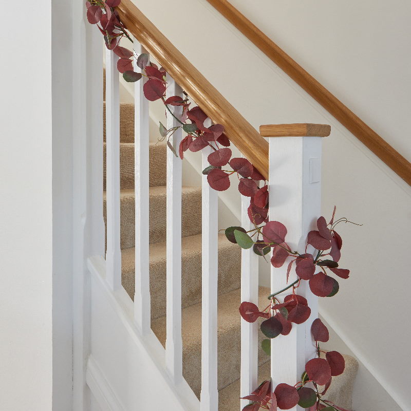 Violet Eucalyptus Garland Wedding Decoration as a home decoration on a staircase