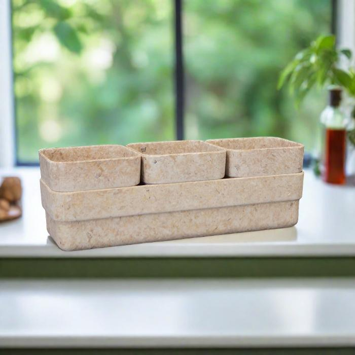 Oatmeal Chaff Windowsill Trio Seed Pots with Tray on a windowsill