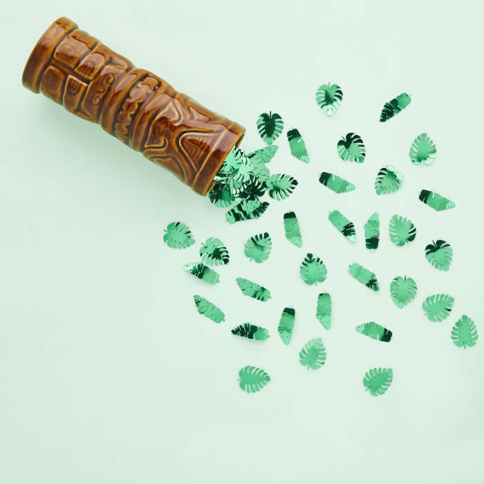 Tropical Leaf Confetti on a table