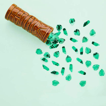 Tropical Leaf Confetti on a table